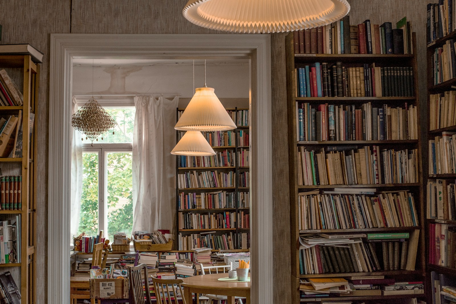 books on brown wooden shelf